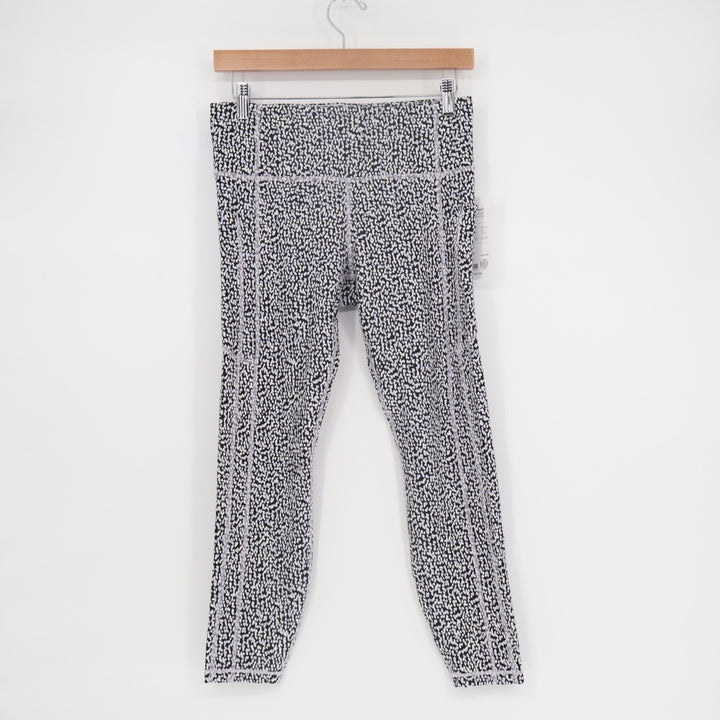 Athleta Ultimate Stash Textured 7/8 Leggings Womens M White Black Leopard Print