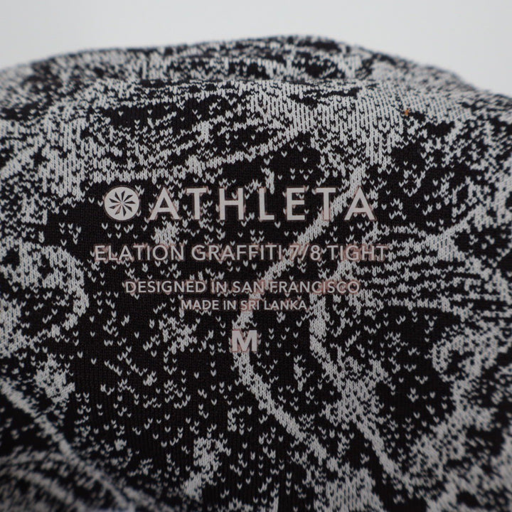 Athleta Elation Graffiti 7/8 Tight Leggings Black White Floral Print Size M