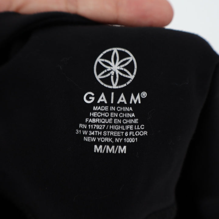 Gaiam Om Lotus Capri Leggings Womens Medium Black Stratch Cutout Hem High-Waist
