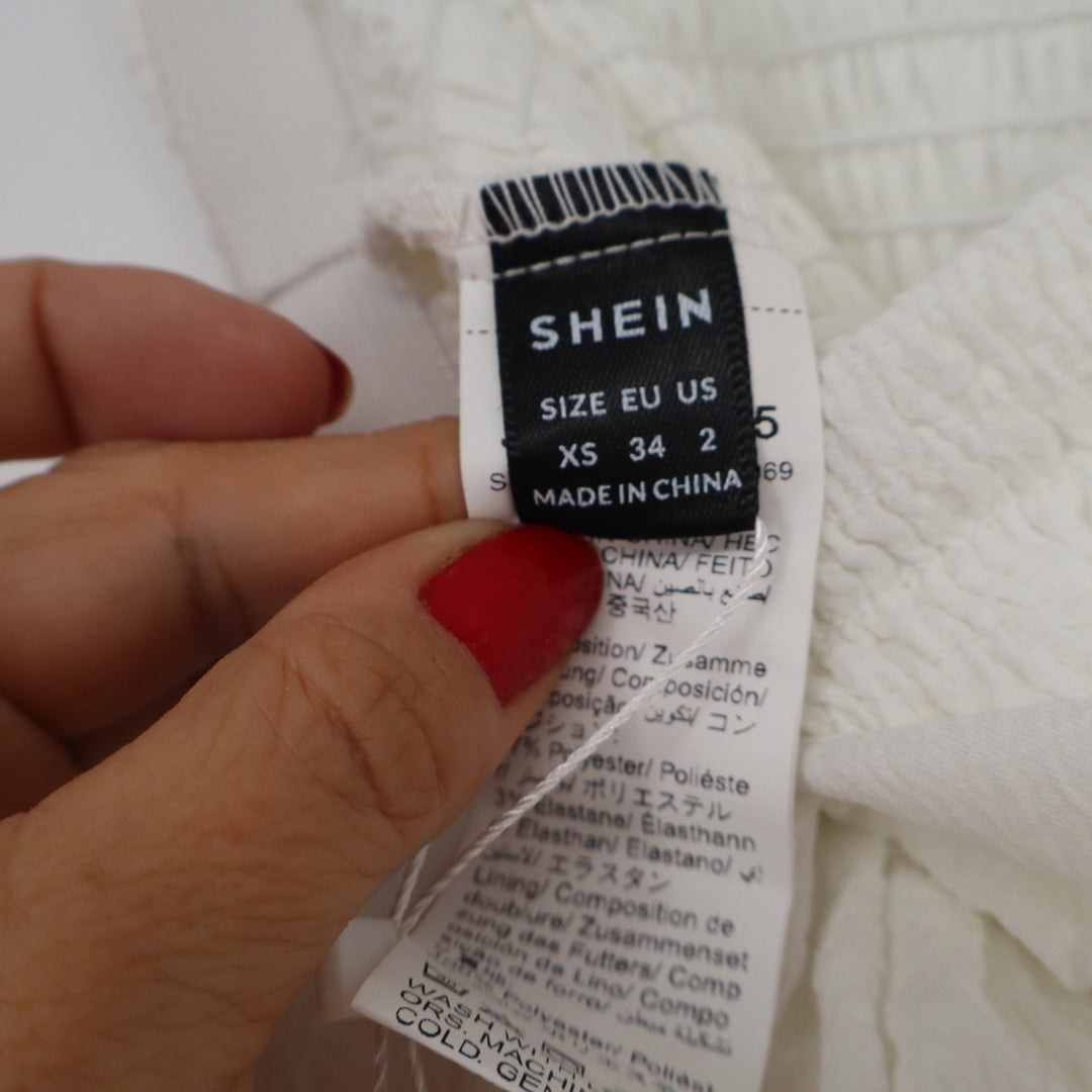 Shein Mod White Tiered Ruffle Mini Skirt Smocked High Waist Tie Front XS NEW