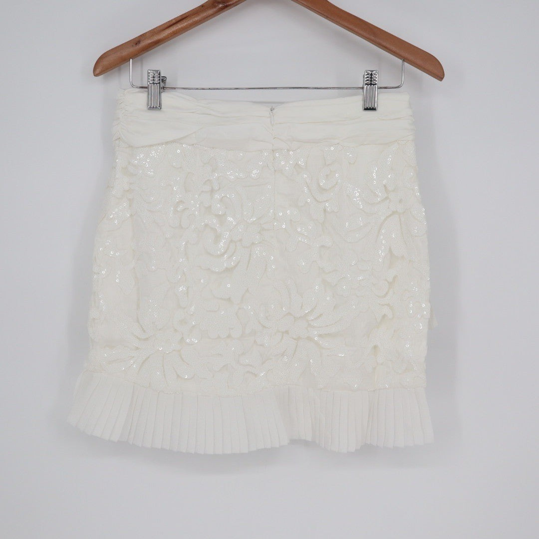 Naked Wardrobe White Sequin Floral Mini Skirt Pleated Ruffle Hem