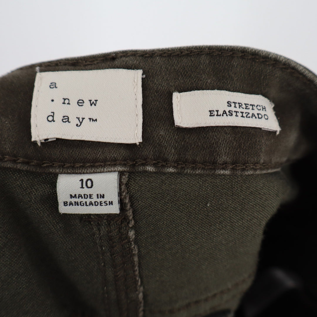 A New Day Olive Green Skinny Moto Pants Knee Seam Raw Hem Size 10 Stretch