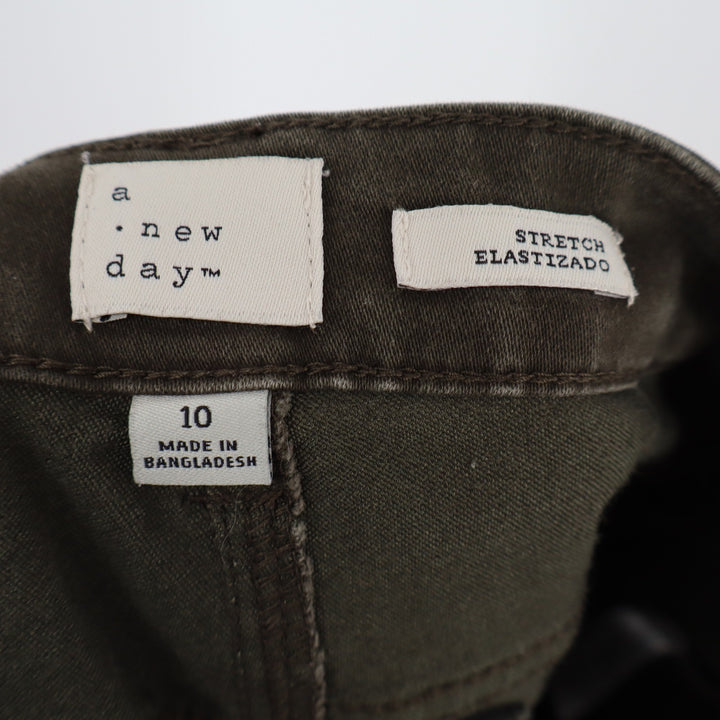 A New Day Olive Green Skinny Moto Pants Knee Seam Raw Hem Size 10 Stretch