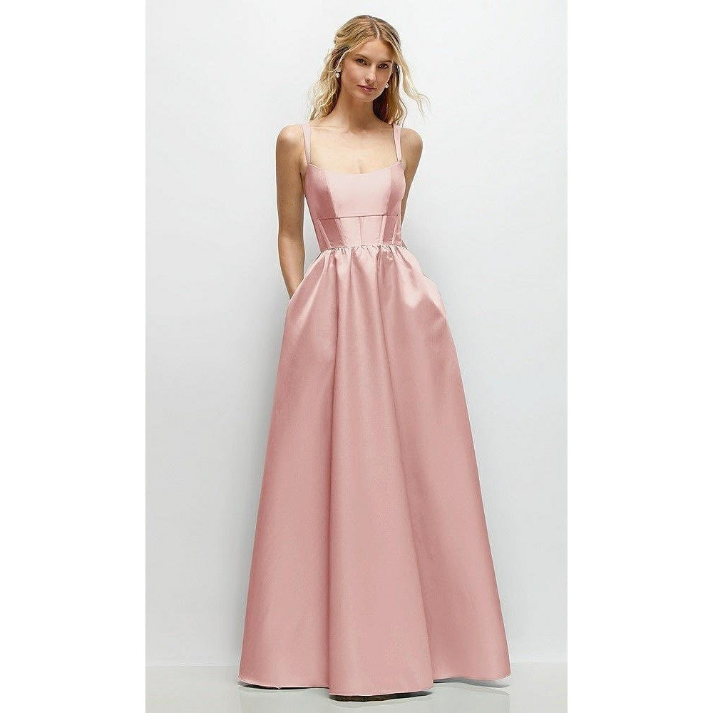 Woman wearing a pink gown on a white background