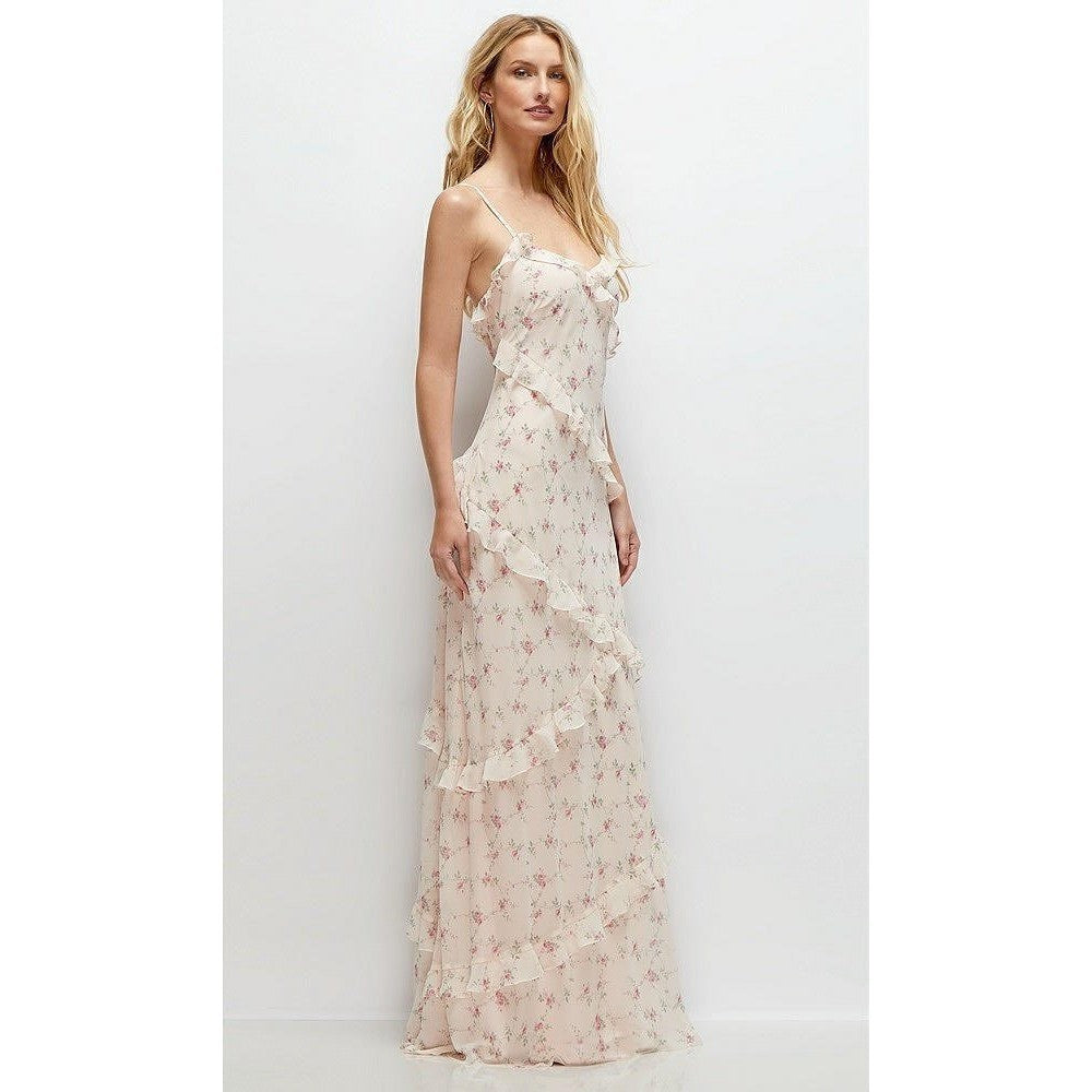 Woman wearing a floral dress against a white background