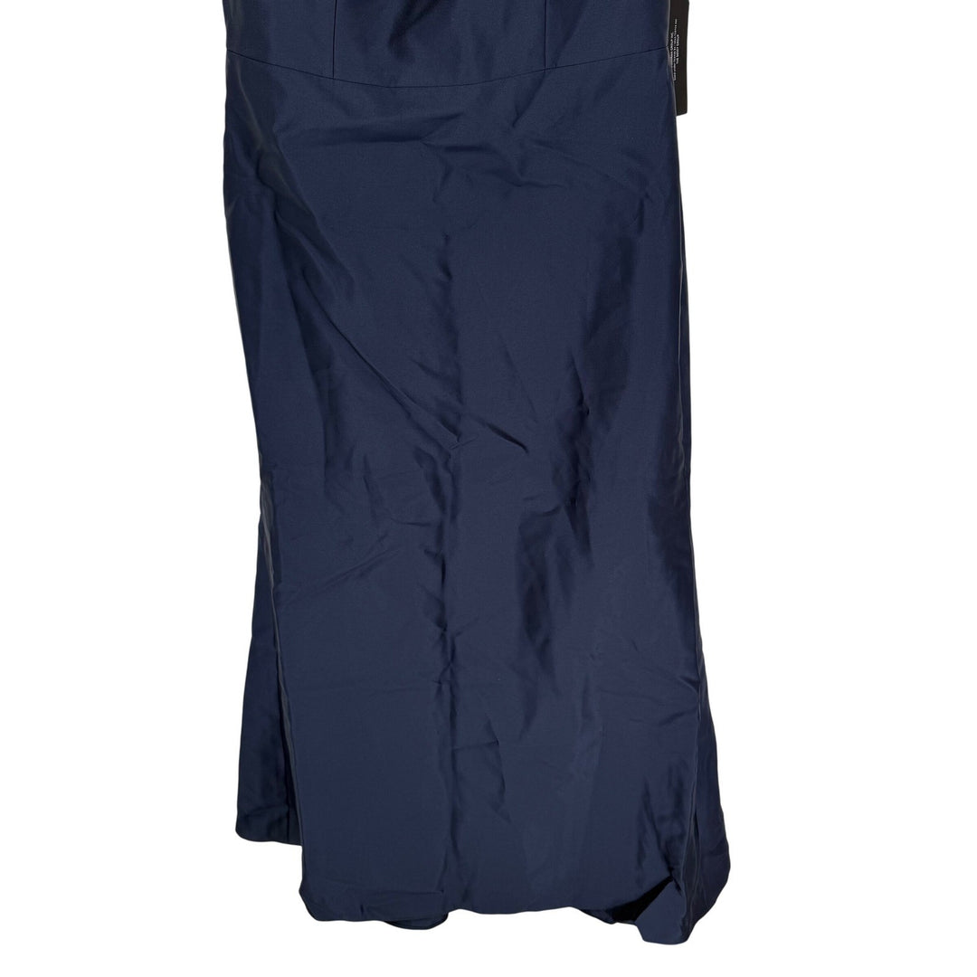 Navy blue dress with a draped design on a white background