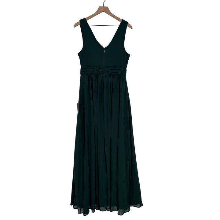 Black sleeveless dress on a hanger against a white background