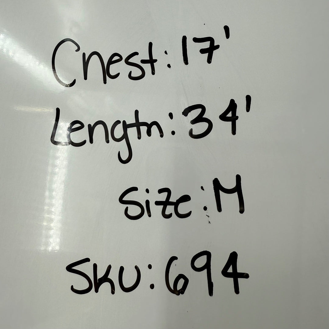 Text on a whiteboard with measurements and product details.