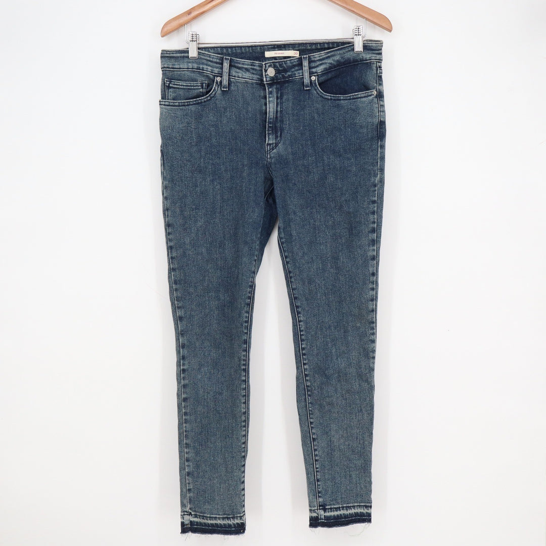 Levis 711 Skinny Jeans Women's 30 Blue Medium Wash Released Raw Hem Stretch