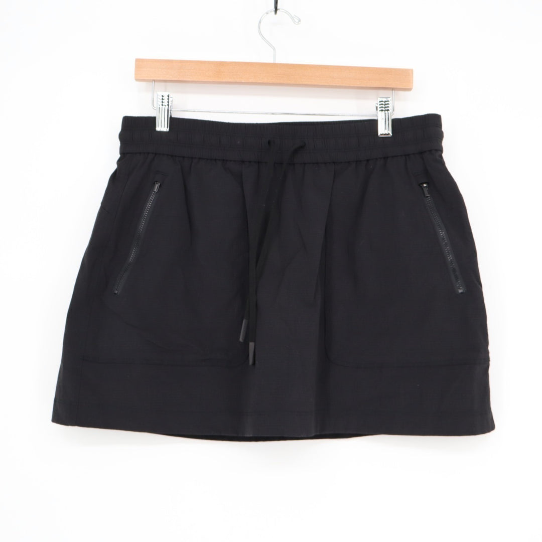 Athleta Soho Skort Womens Medium Black Nylon Stretch Zipper Pockets High Rise