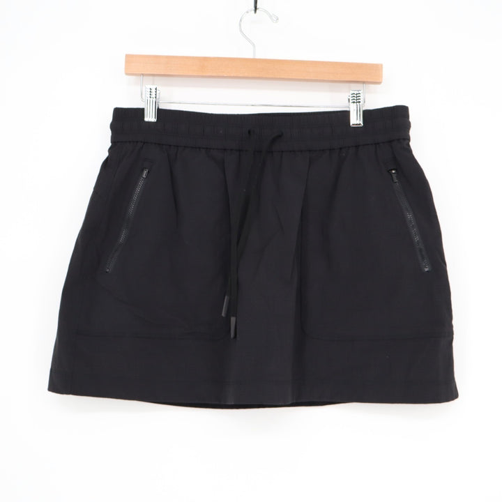 Athleta Soho Skort Womens Medium Black Nylon Stretch Zipper Pockets High Rise