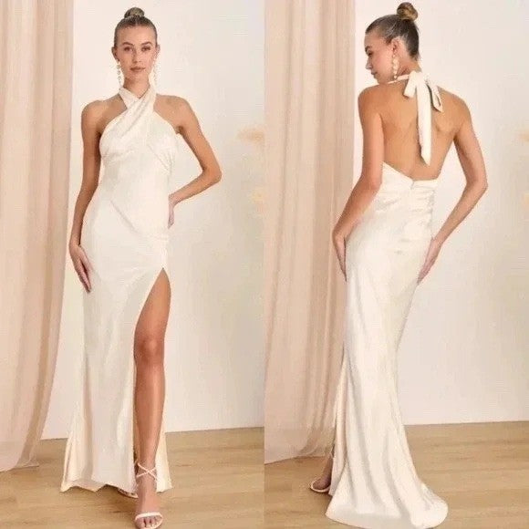 White evening gown with a high slit and open back, shown from front and side views.