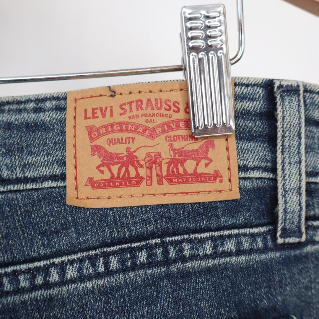 Levis 711 Skinny Jeans Women's 30 Blue Medium Wash Released Raw Hem Stretch
