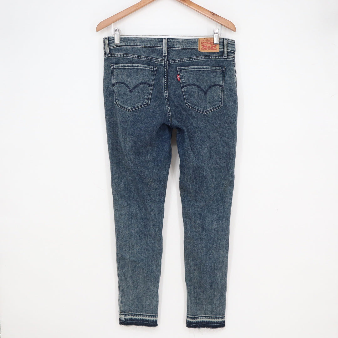 Levis 711 Skinny Jeans Women's 30 Blue Medium Wash Released Raw Hem Stretch