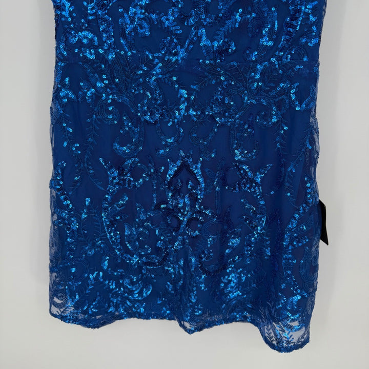 Blue sequin dress on a white background