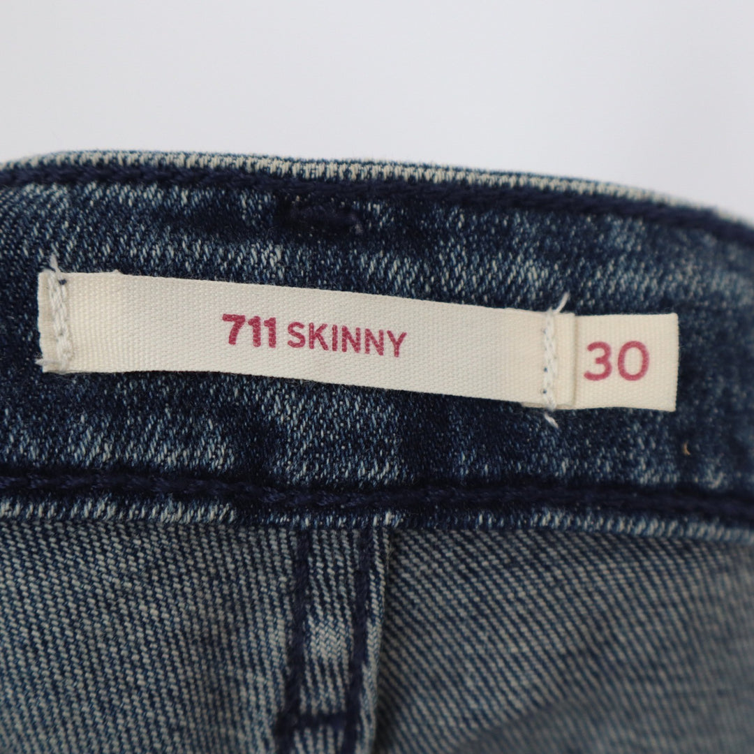 Levis 711 Skinny Jeans Women's 30 Blue Medium Wash Released Raw Hem Stretch
