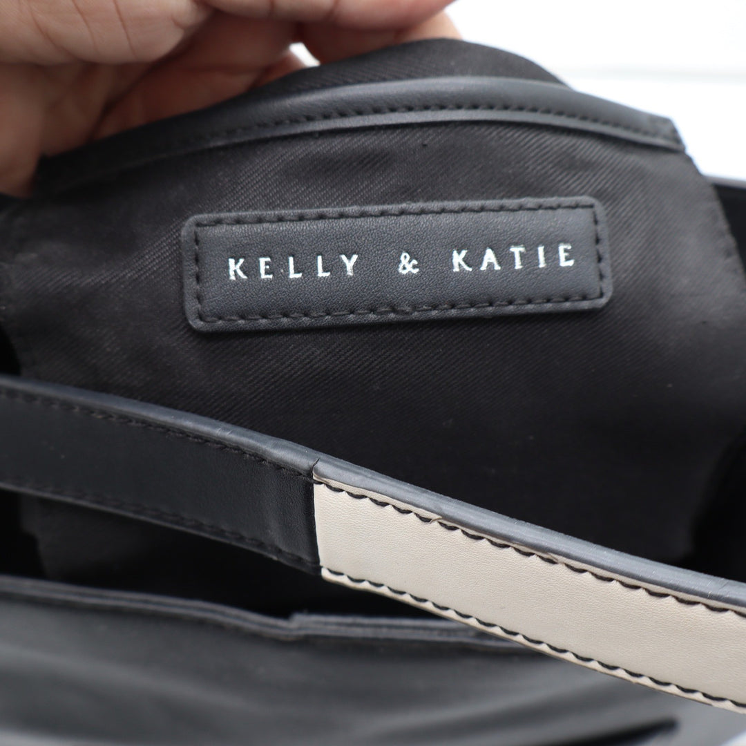 Kelly & Katie Black Faux Leather Hobo Bag Tassel Charm Crossbody