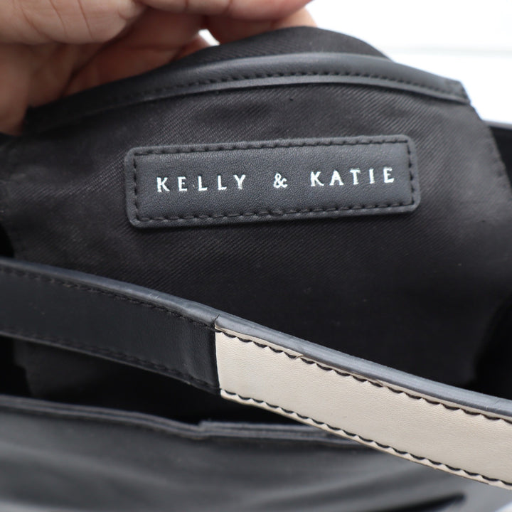 Kelly & Katie Black Faux Leather Hobo Bag Tassel Charm Crossbody