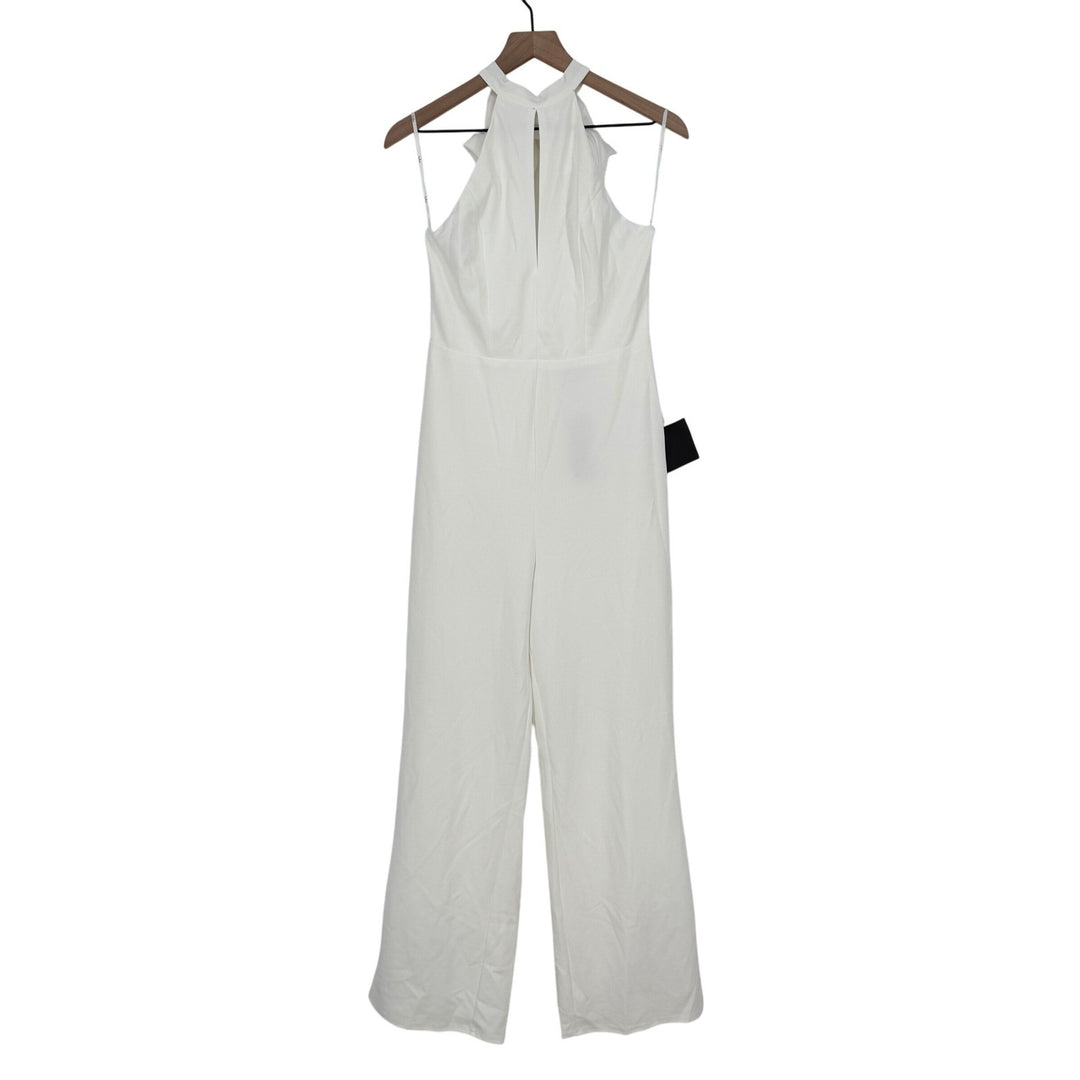 White jumpsuit on a hanger against a white background
