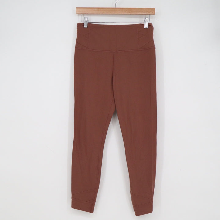 Athleta Elation Pirouette 7/8 Tight Leggings Brown Medium Crisscross Ankle High