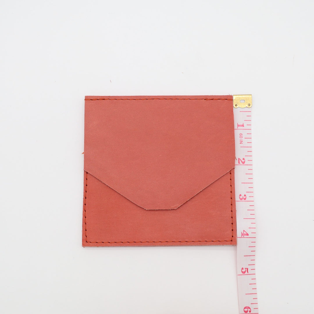 ABLE Womens Minimalist Card Holder Orange Leather Embossed Logo Fold Over Flap