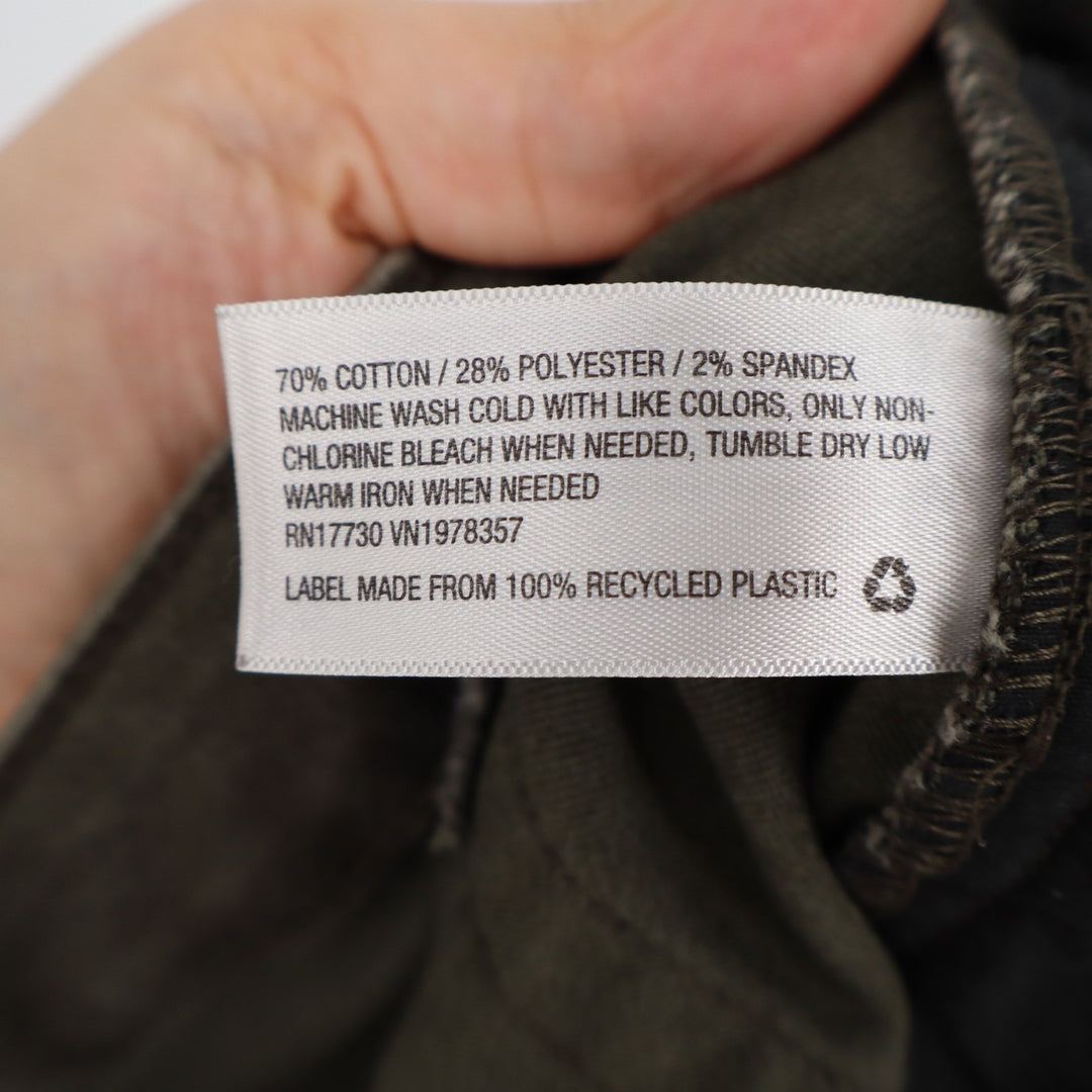 A New Day Olive Green Skinny Moto Pants Knee Seam Raw Hem Size 10 Stretch
