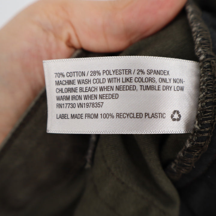 A New Day Olive Green Skinny Moto Pants Knee Seam Raw Hem Size 10 Stretch