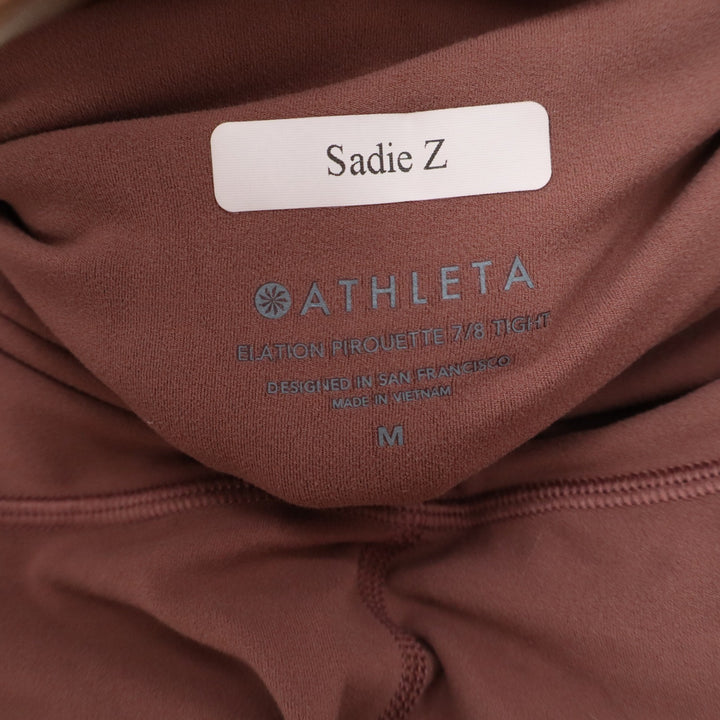 Athleta Elation Pirouette 7/8 Tight Leggings Brown Medium Crisscross Ankle High