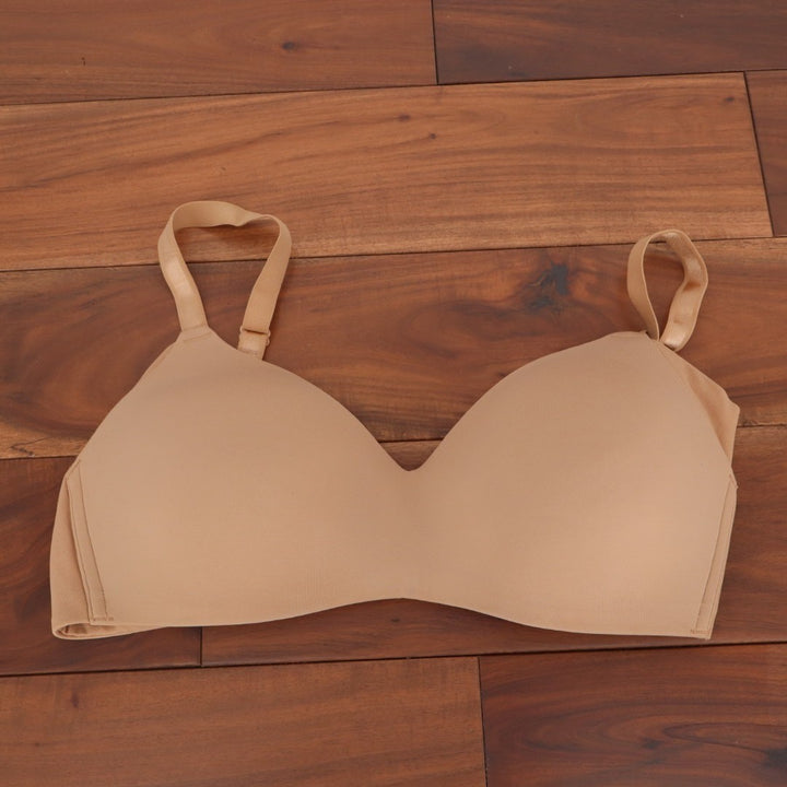 Warners No Side Effects Underarm Smoothing Bra Womens 36D Nude Wireless Padded