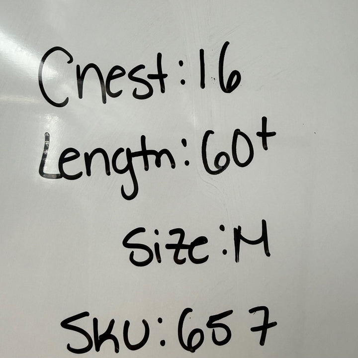 Text on a whiteboard with measurements and product details.