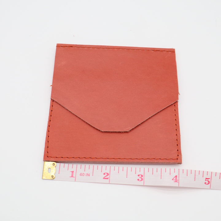 ABLE Womens Minimalist Card Holder Orange Leather Embossed Logo Fold Over Flap
