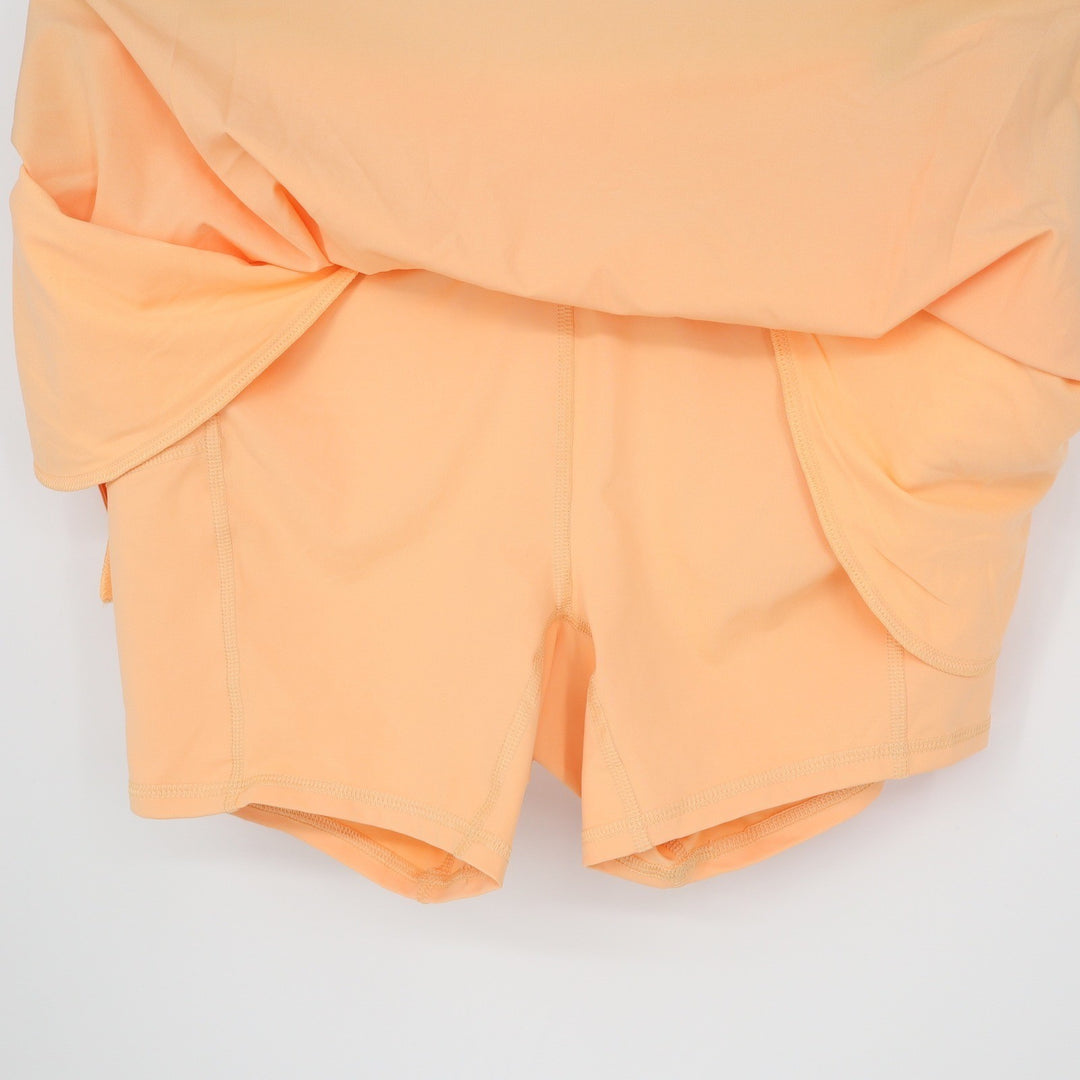Calia Womens TrueLight Golf Skort Peach Sherbet Orange Striped Size 4