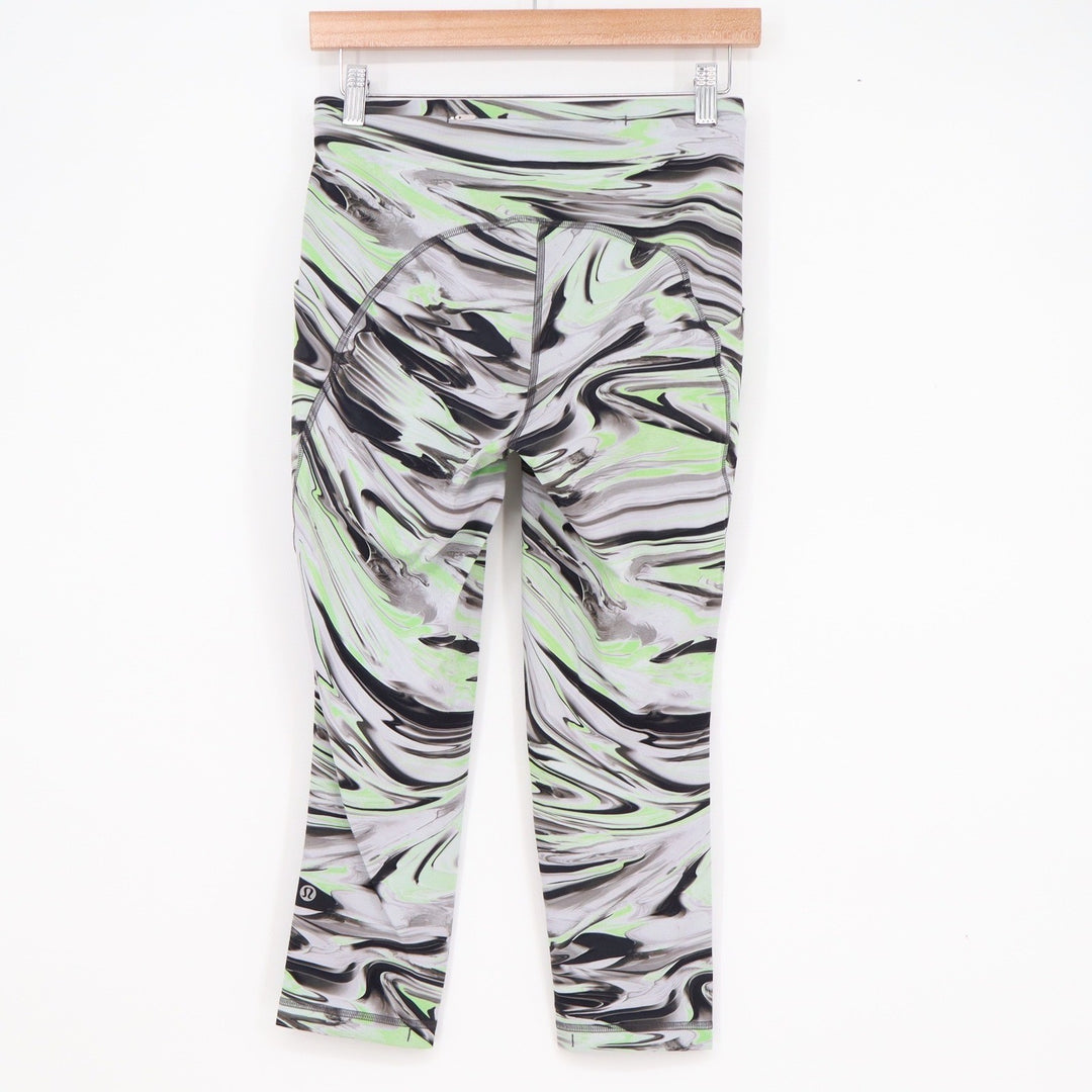 Lululemon Speed Up Crop 21 Leggings Hyper Swirl Black Lime Green Size 6