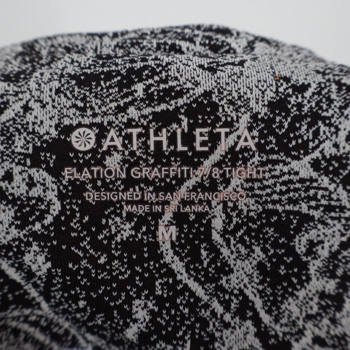 Athleta Elation Graffiti 7/8 Tight Leggings Black White Floral Print Size M