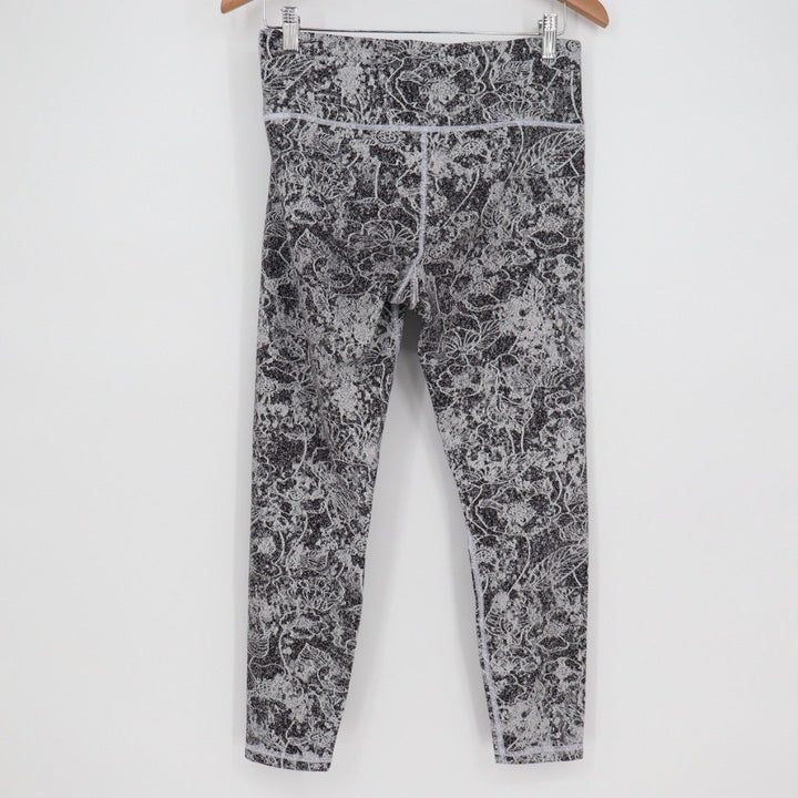 Athleta Elation Graffiti 7/8 Tight Leggings Black White Floral Print Size M