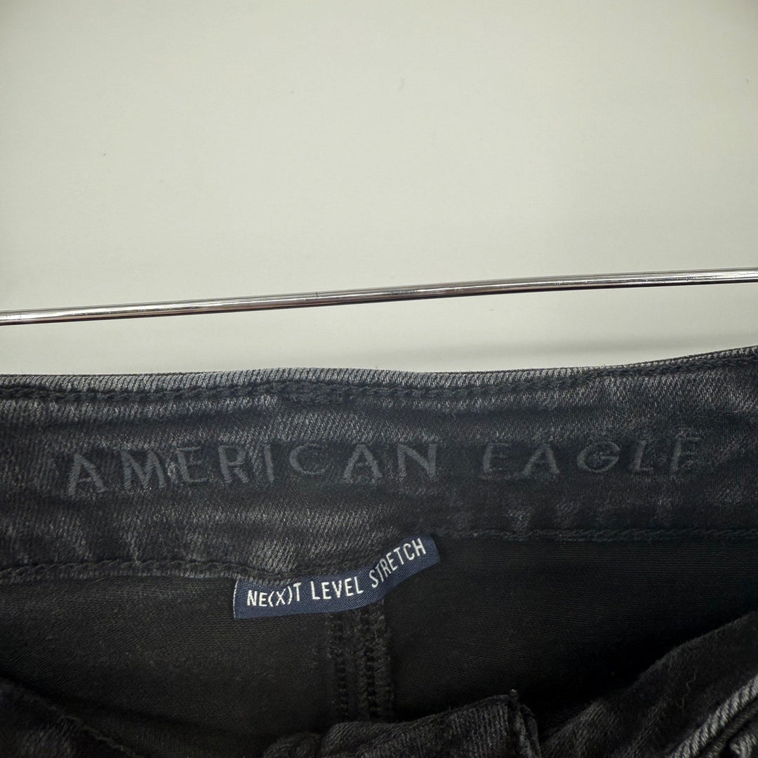 American Eagle Black High Rise Ripped Knee Jeans Next Level Stretch Size 10