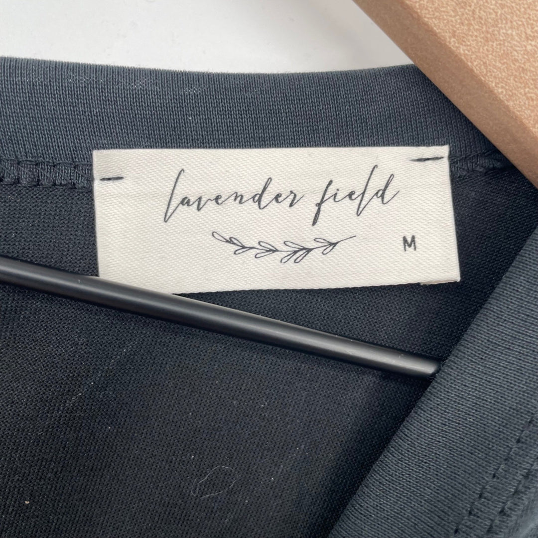 lavender field black peplum tee Romper keyhole back size m