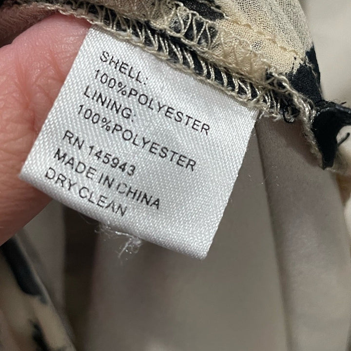 Toccin X RTR Zebra Romper Size 10