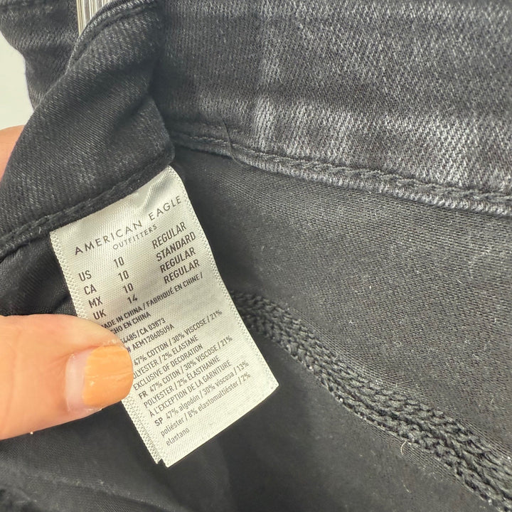American Eagle Black High Rise Ripped Knee Jeans Next Level Stretch Size 10